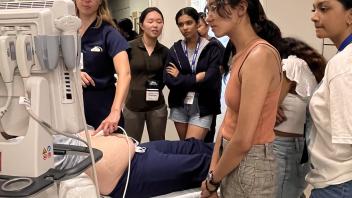 UC Davis Pre-College students watch an ultrasound demonstration at the UC Davis Emergency Medicine department in Sacramento
