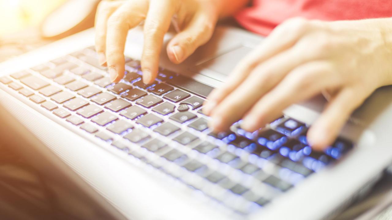 woman working at a laptop computer
