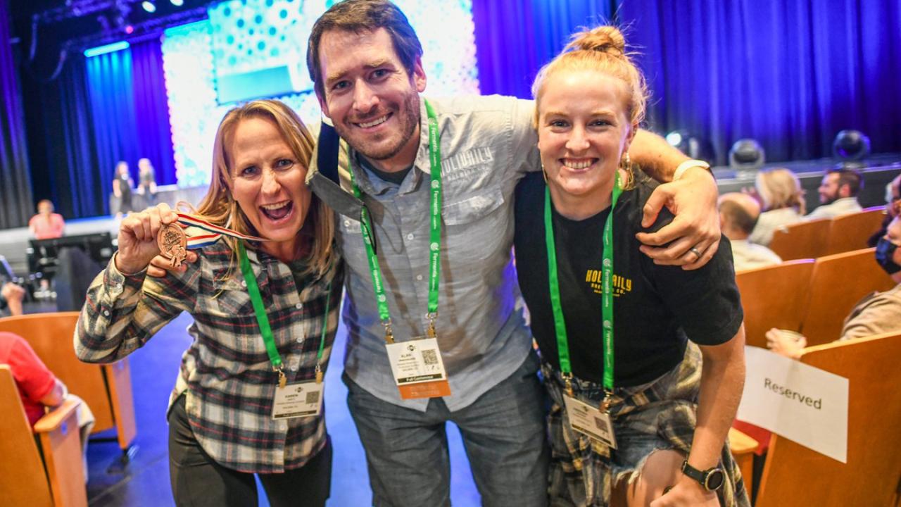 UC Davis Master Brewers grad Alan Windhause poses GABF Bronze Award with Holidaily Brewing Co.