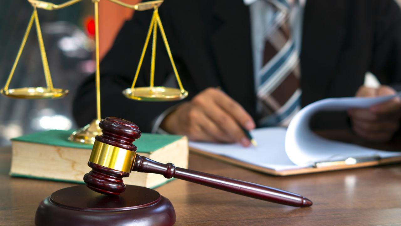 paralegal professional at desk