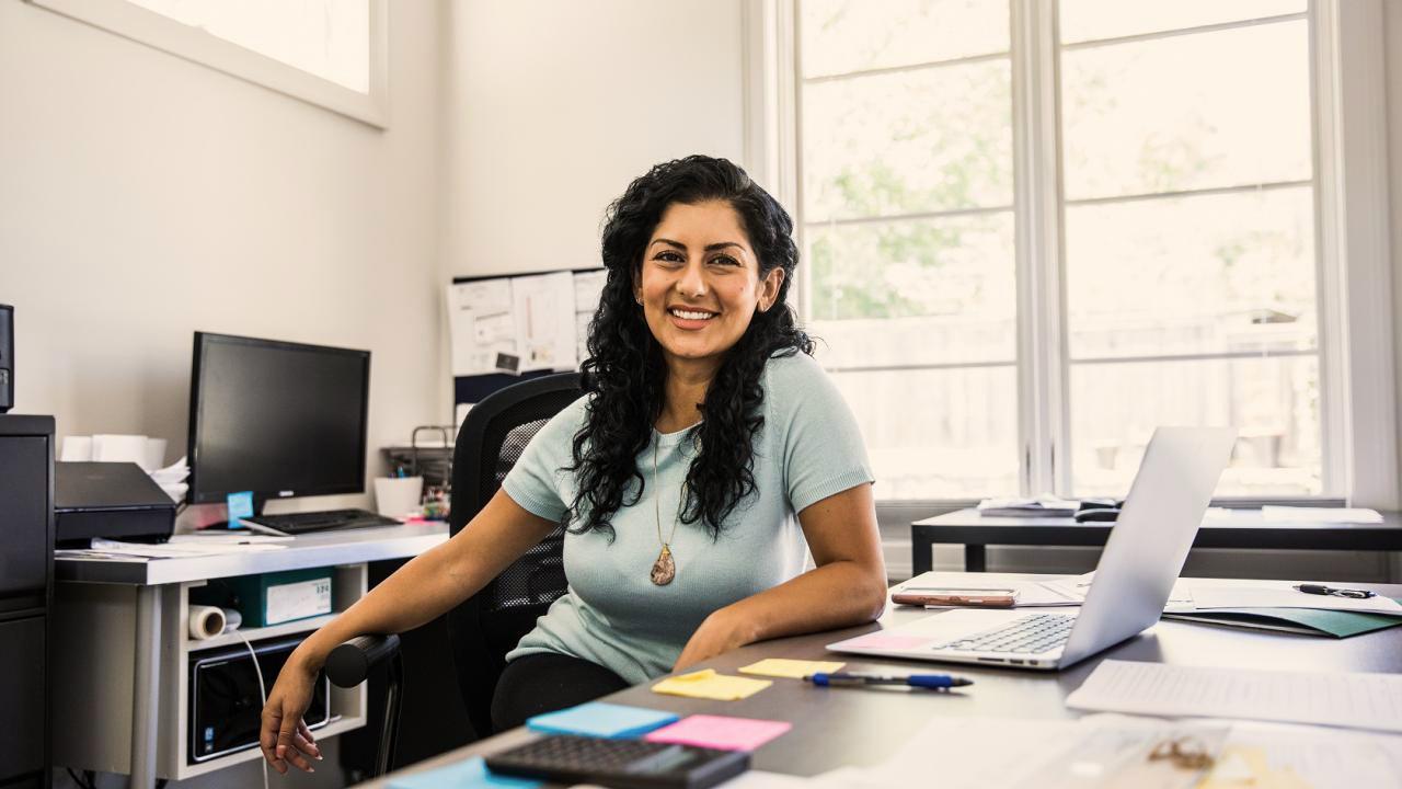 HR Professional Smiling at the Camera