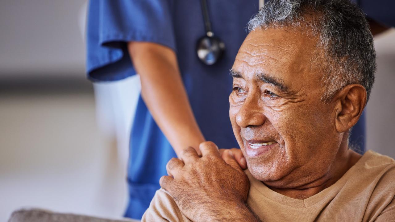 elderly man looking pensive