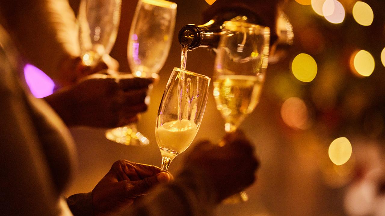 champagne being poured into glasses