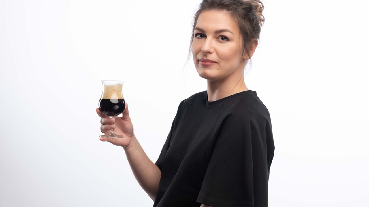 2022 UC Davis Tapping Potential Winner Lana Svitankova poses with a glass of beer