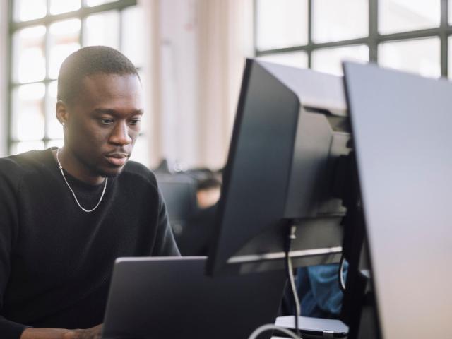 man working on computer