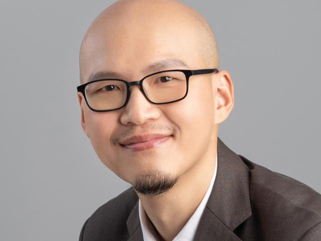 headshot of Coaching Certificate Program grad Laurence Tseng