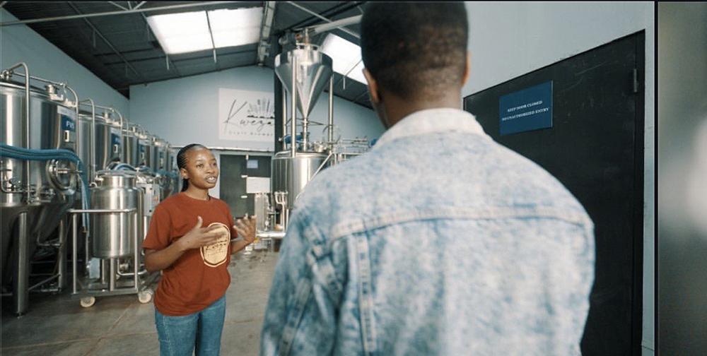 Tapiwa leads a brewery tour at Kweza Craft Brewery