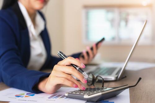 woman using a calculator