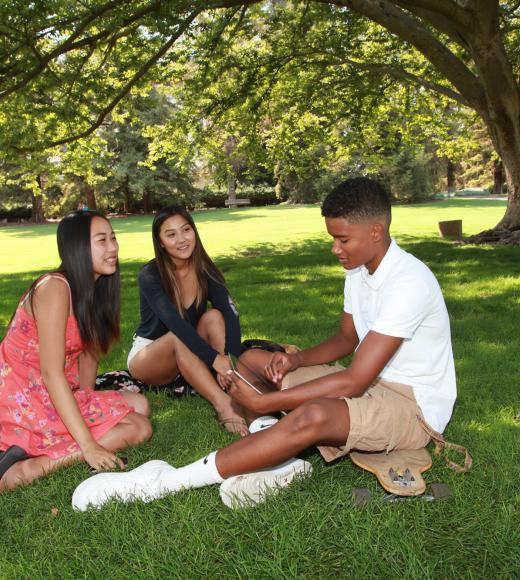 high school students talking outside