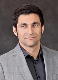 headshot of UC Davis construction management instructor Amir Zavichi