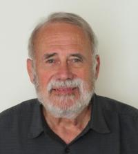 headshot of UC Davis professor James Carey