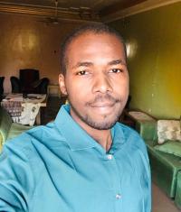 UC Davis Coursera student Mohammed Mawlod poses before his first day at his new job as a GIS specialist