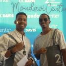 UC Davis Health Professions Post-Bac grad Adejia Boutte, Jr on the left stands with a friend at Mondavi