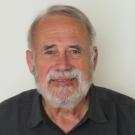 headshot of UC Davis professor James Carey