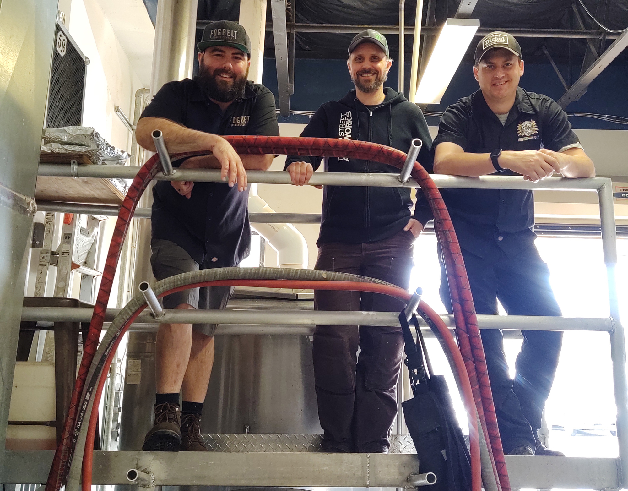 Remy, Tyler and Andy on brew deck at brewery