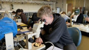 UC Davis Pre-College students examine samples in the main classroom at BML