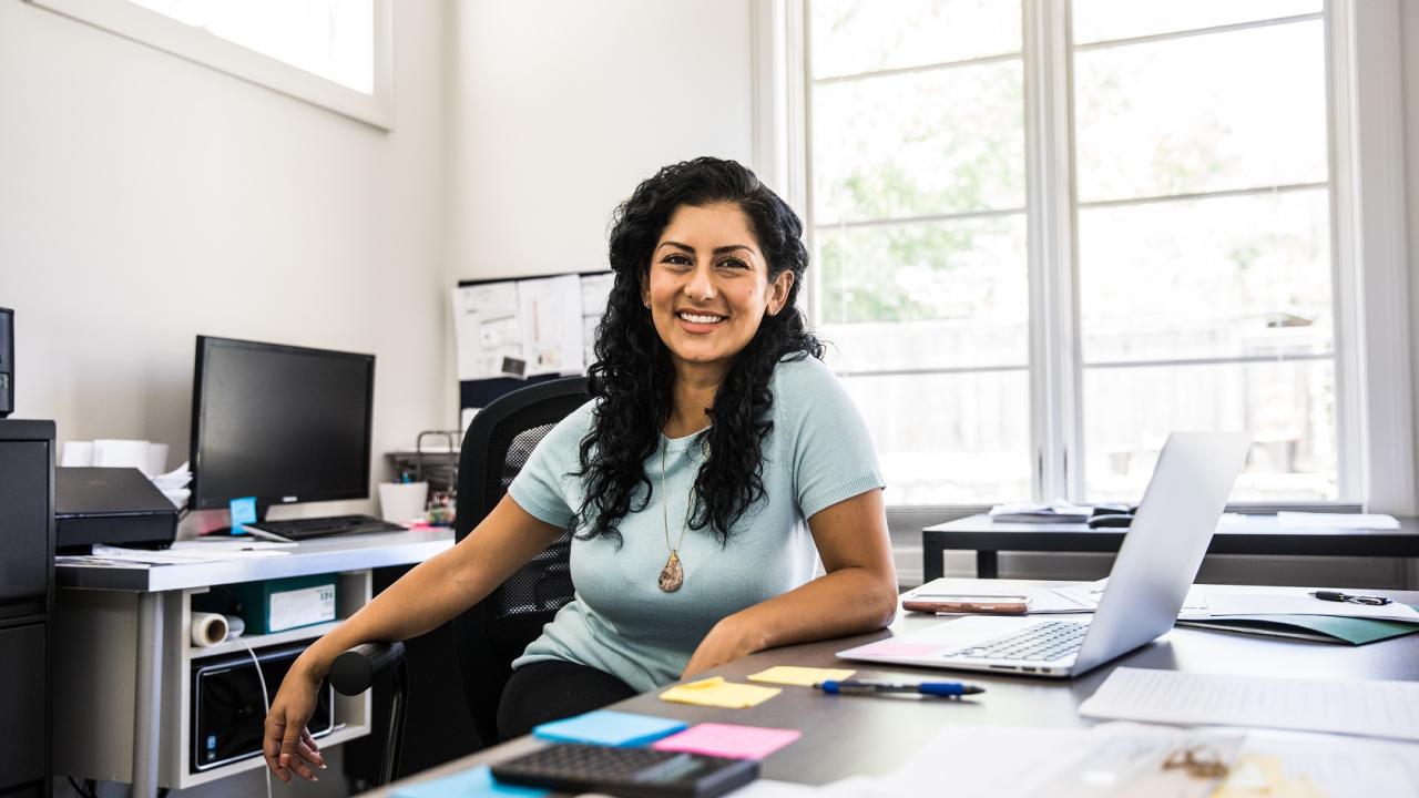 HR Professional Smiling at the Camera