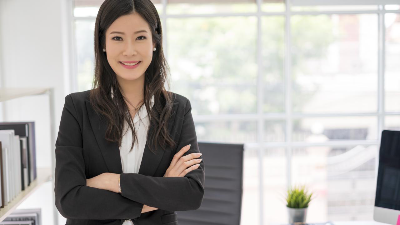 Employee looking at the camera in a work setting