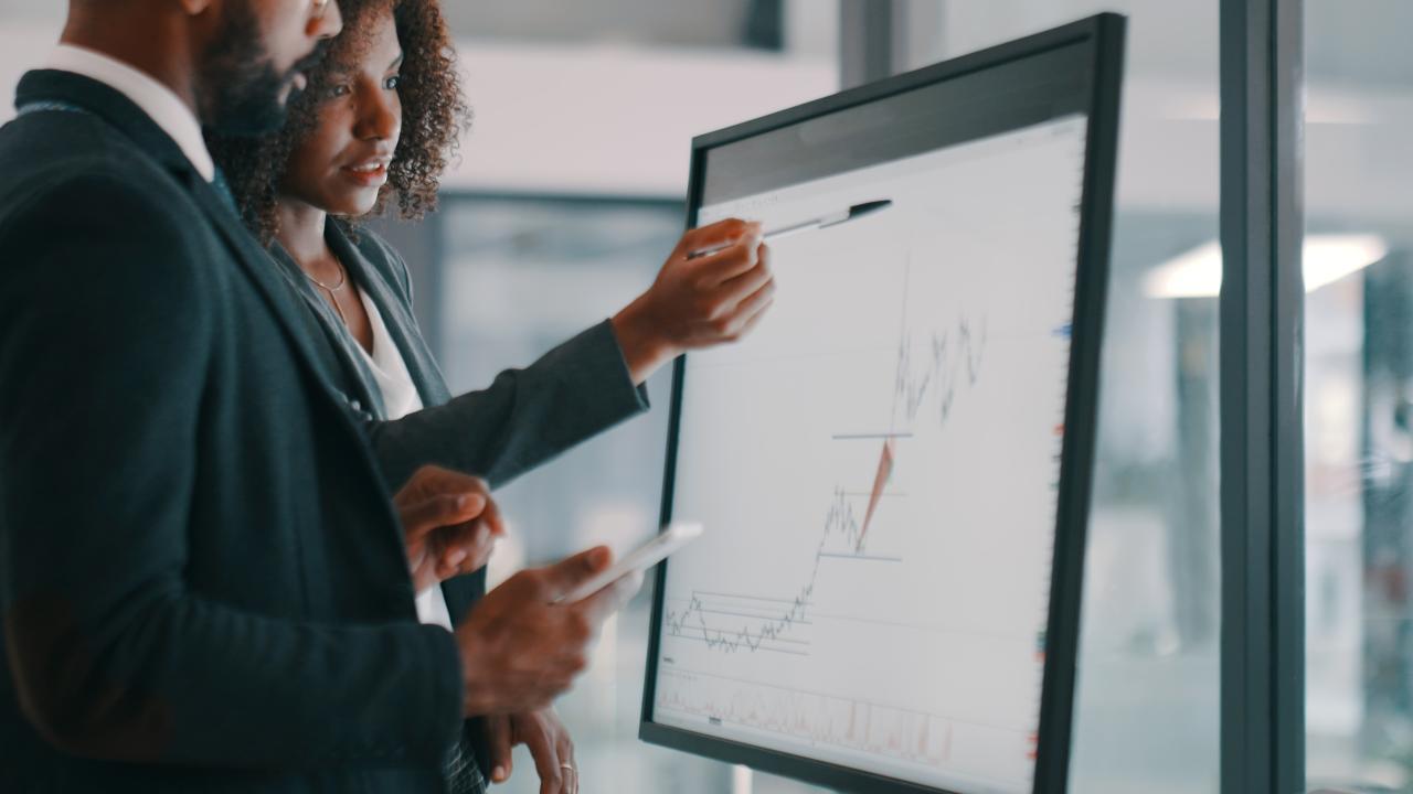 Data Analyst looking at graphs