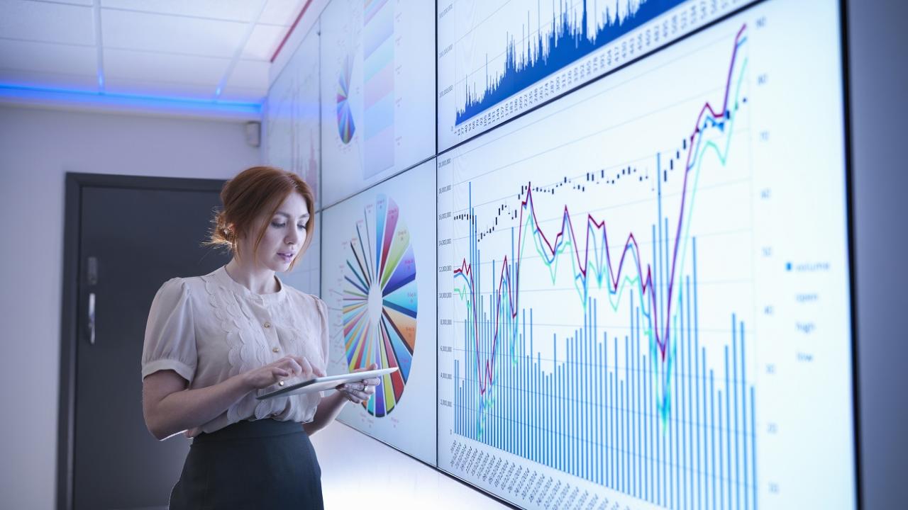 Data Analyst looking at a bunch of graphs