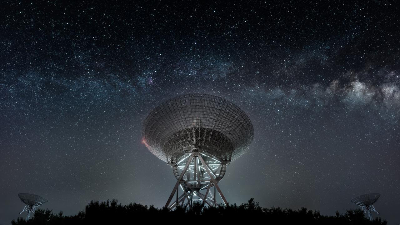 radio telescope in night sky