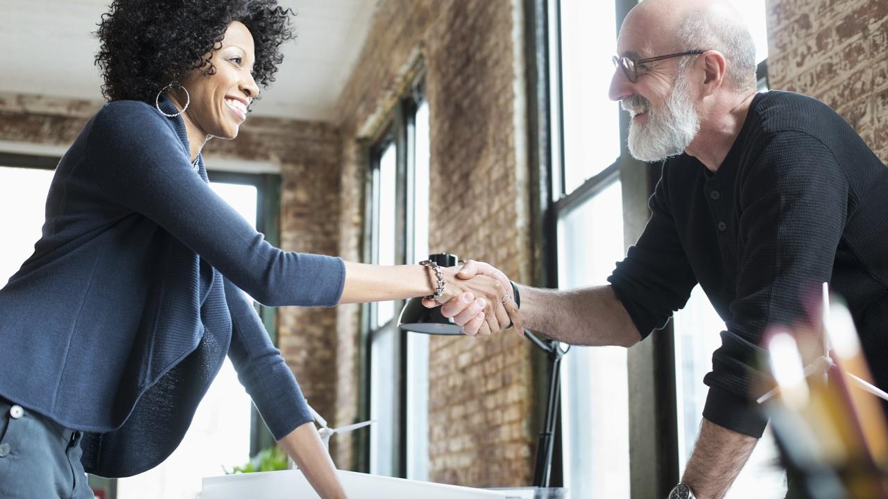 Two people shaking hands