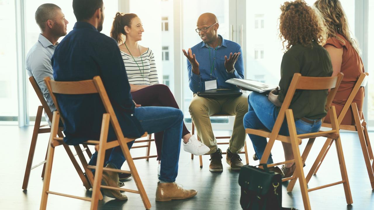 People sitting in a group circle