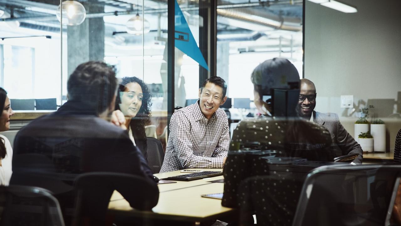 Gathering of people in a meeting room
