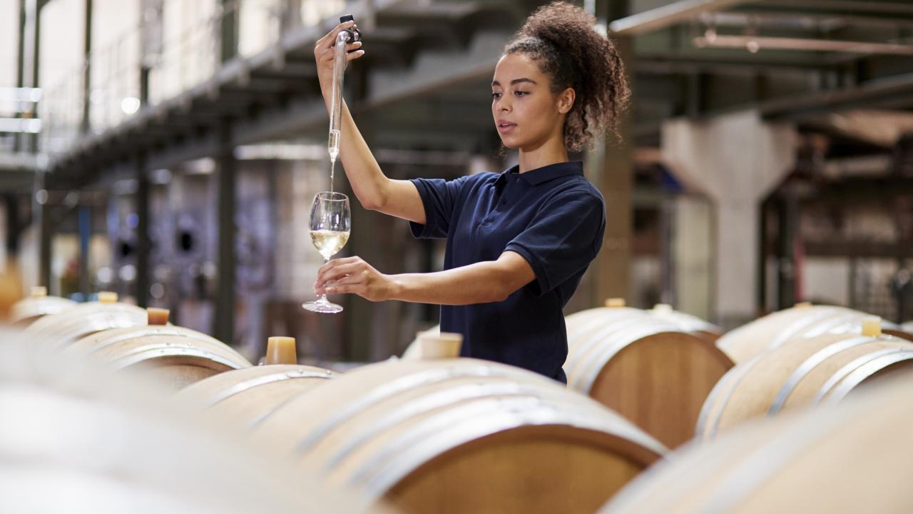 Woman testing wine