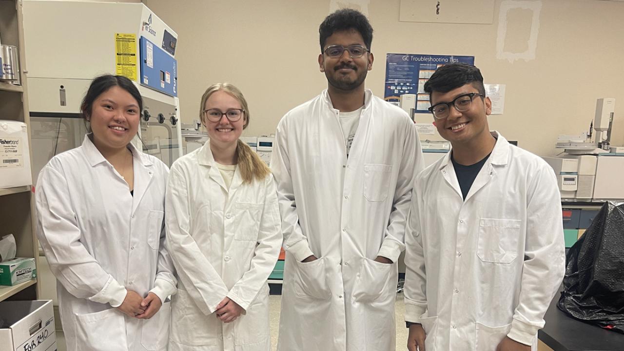 Forensic Science students pose for a photo in the lab