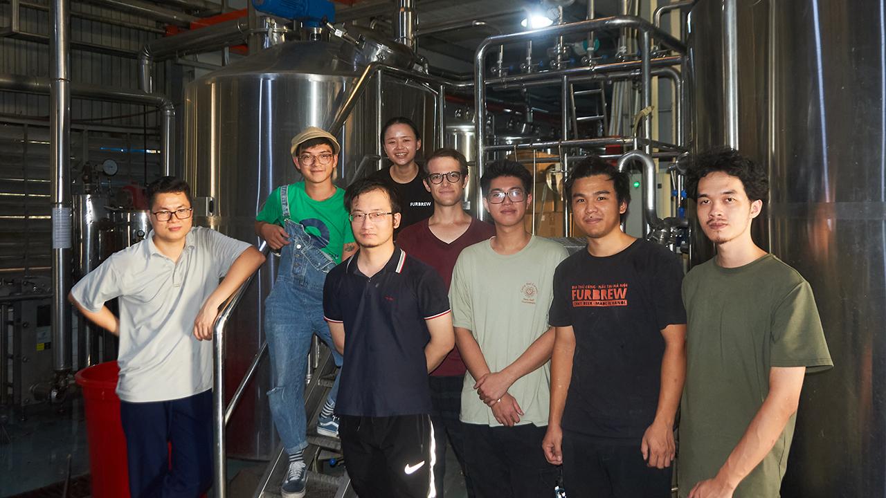 UC Davis Tapping Potential Scholarship winner Dung Ngo poses with members from Overmorrow Brewery during collab brew