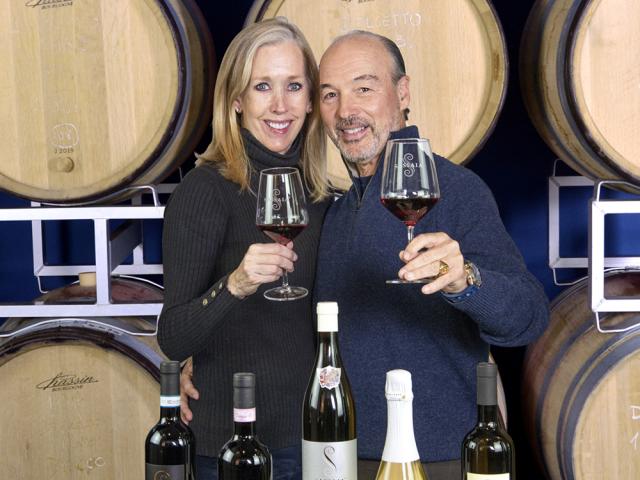 Enrico de Alessandrini and wife with wine