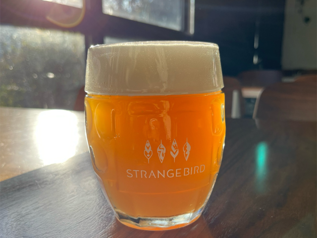 image of Strangebird beer, Cathedral Windows in glass