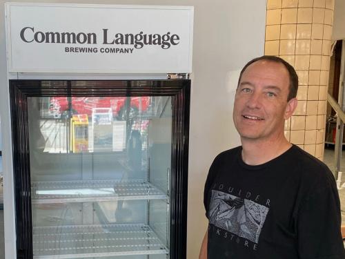 Common Language Brewing partner and branded fridge