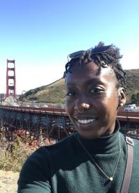 Kristen Fawole, chemical engineering of coffee instructor, poses near Golden Gate bridge